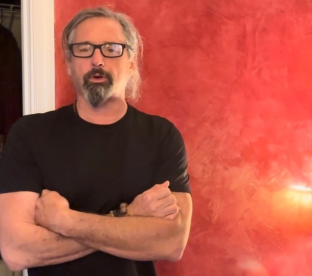 Ron in front of a grasello polished lime paster wall with gold wax